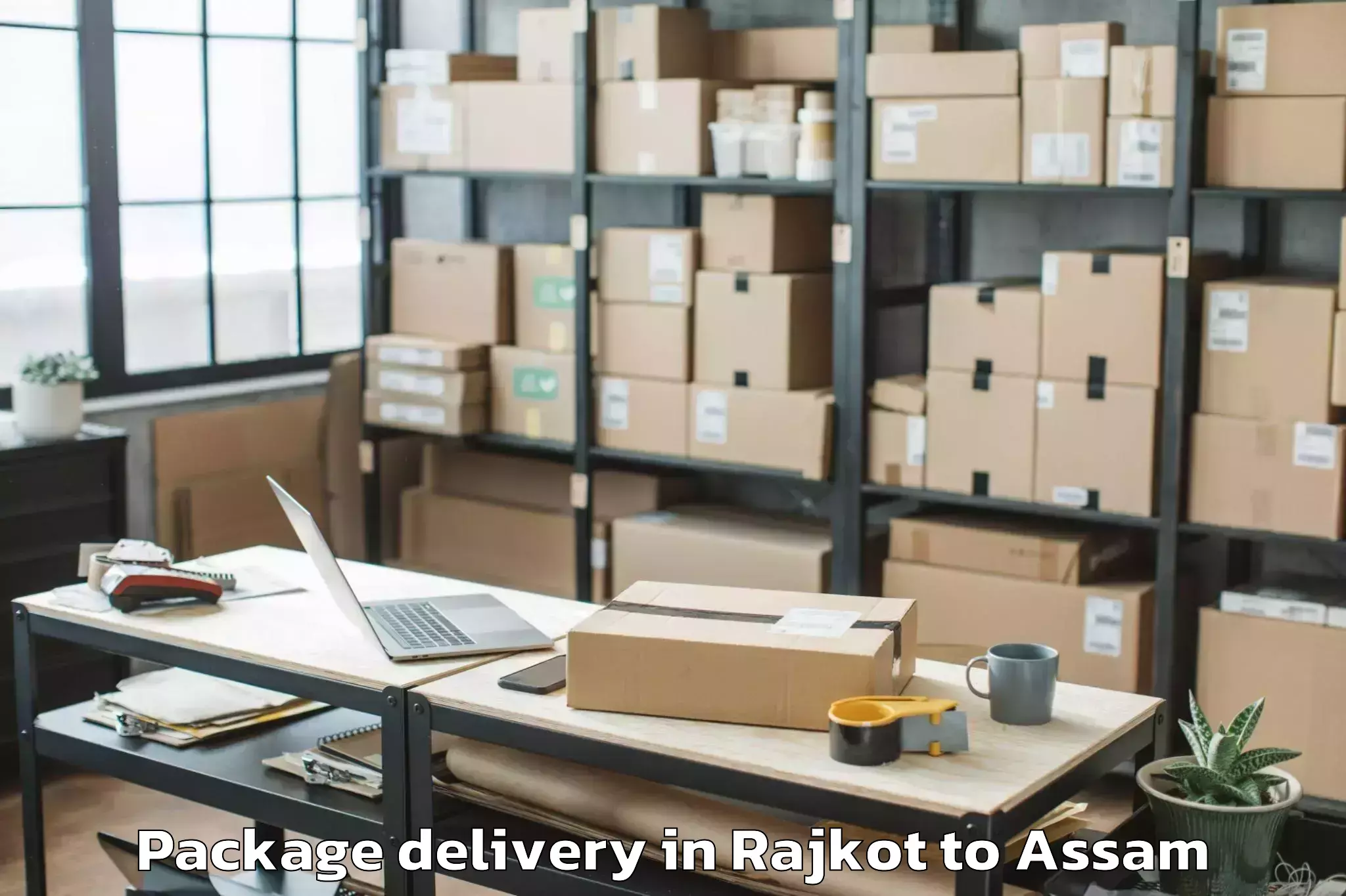 Book Rajkot to Pachim Nalbari Package Delivery